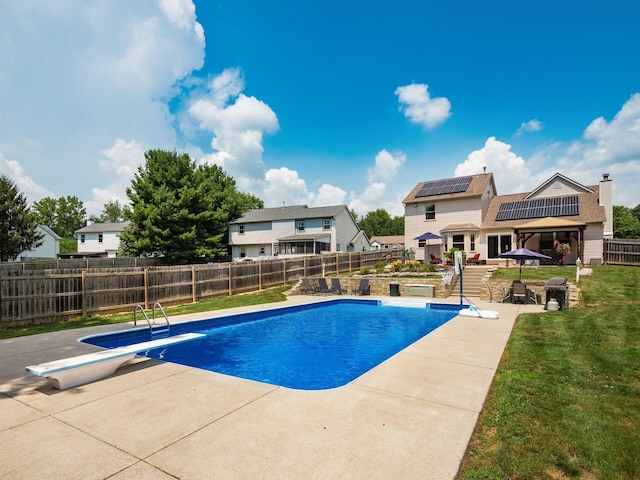 238 Key Blvd, Pataskala, OH 43062 - view of pool featuring a diving board, a patio area, and a fenced backyard