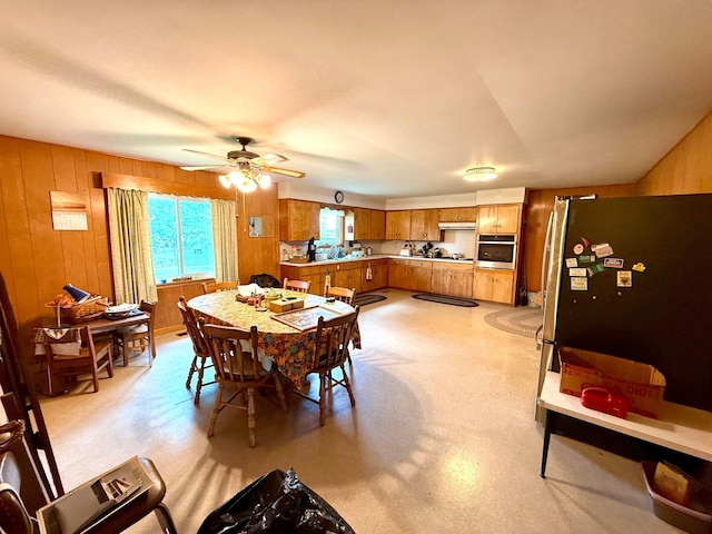 403 N Columbus St, Somerset, OH 43783 - dining space featuring wooden walls and ceiling fan