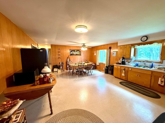 403 N Columbus St, Somerset, OH 43783 - dining room with wooden walls and a ceiling fan