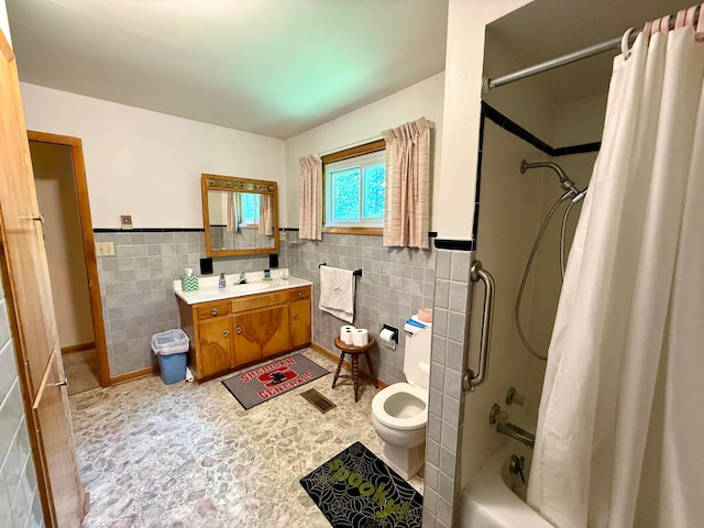 403 N Columbus St, Somerset, OH 43783 - full bathroom featuring tile walls, vanity, a wainscoted wall, shower / bath combination with curtain, and tile patterned floors