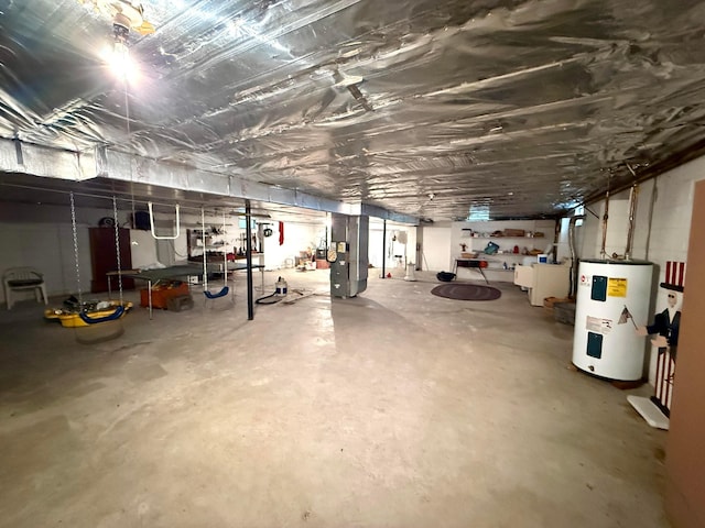 403 N Columbus St, Somerset, OH 43783 - unfinished below grade area featuring electric water heater and heating unit