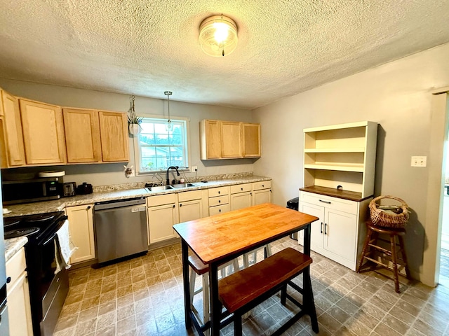 205 Sherman Ave, Lancaster, OH 43130 - kitchen with appliances with stainless steel finishes, a textured ceiling, light brown cabinetry, light countertops, and decorative light fixtures
