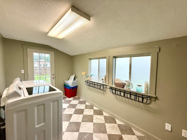 205 Sherman Ave, Lancaster, OH 43130 - corridor with separate washer and dryer, a textured ceiling, and lofted ceiling