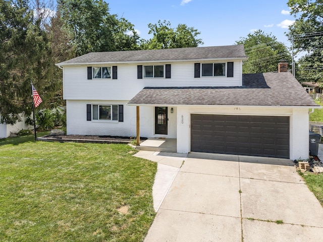 620 Fleetrun Ave, Columbus, OH 43230 - view of front of property featuring brick siding, driveway, a front lawn, and a shingled roof
