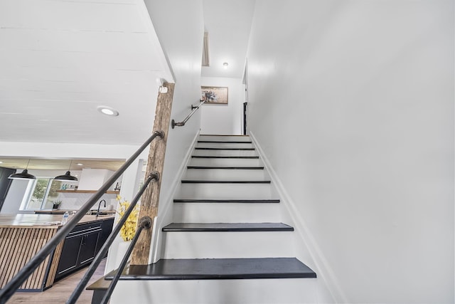 620 Fleetrun Ave, Columbus, OH 43230 - stairway featuring wood finished floors and recessed lighting