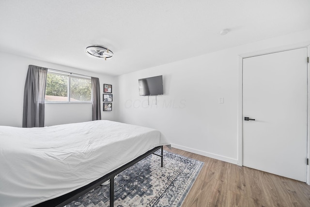 620 Fleetrun Ave, Columbus, OH 43230 - bedroom with wood finished floors and baseboards