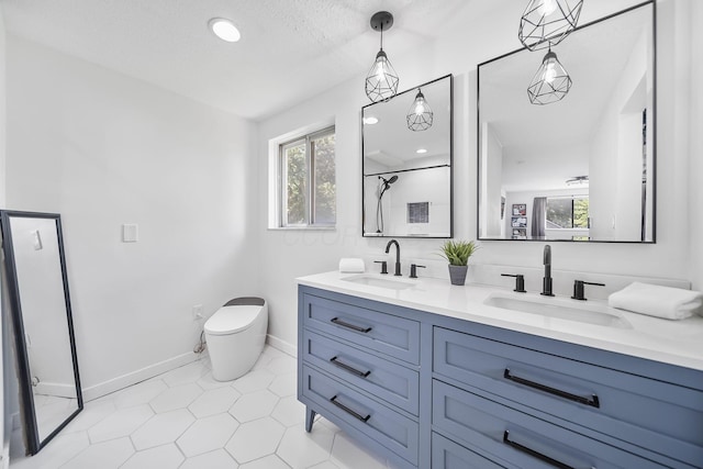 620 Fleetrun Ave, Columbus, OH 43230 - full bathroom with double vanity, tile patterned flooring, recessed lighting, and a shower