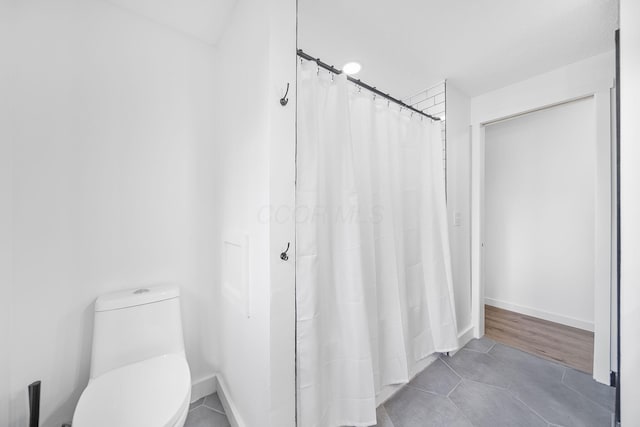 620 Fleetrun Ave, Columbus, OH 43230 - full bath with tile patterned floors and a shower with shower curtain