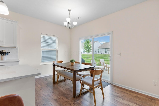 507 Curry Dr, Pataskala, OH 43062 - dining space featuring a chandelier and wood finished floors