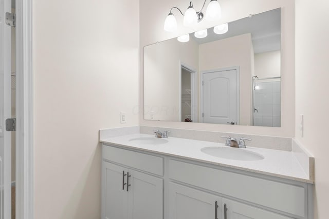 507 Curry Dr, Pataskala, OH 43062 - full bath with double vanity, a walk in closet, and a shower