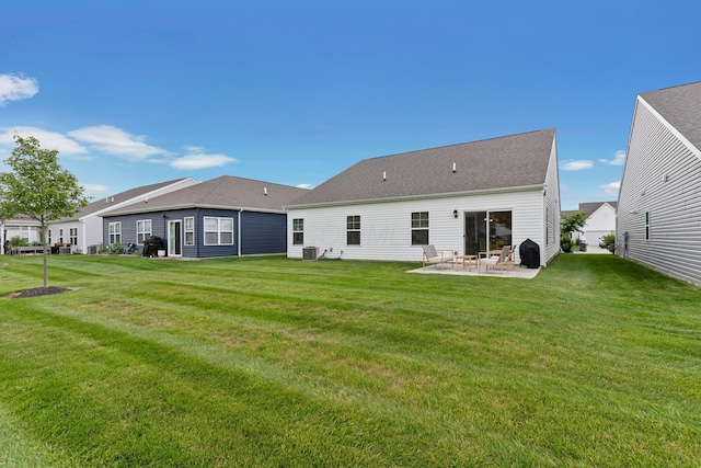 507 Curry Dr, Pataskala, OH 43062 - back of property featuring a patio area and a yard