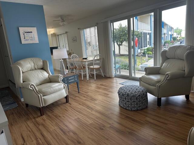 241 Chase Ave Unit B1L, Russells Point, OH 43348 - living area featuring a ceiling fan and wood finished floors