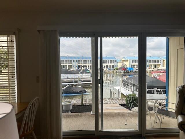 241 Chase Ave Unit B1L, Russells Point, OH 43348 - doorway featuring a water view and healthy amount of natural light