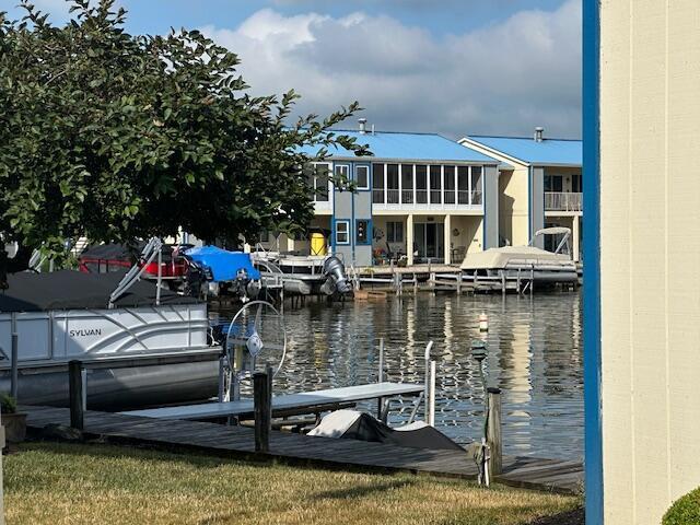241 Chase Ave Unit B1L, Russells Point, OH 43348 - dock featuring a water view