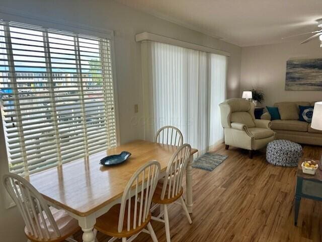 241 Chase Ave Unit B1L, Russells Point, OH 43348 - dining space with wood finished floors and ceiling fan