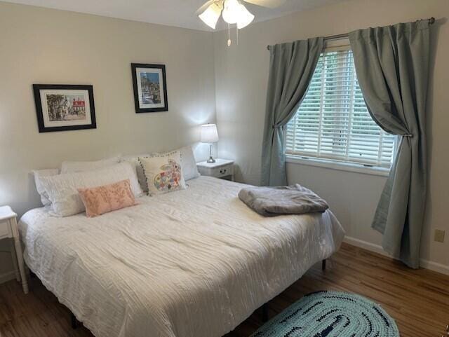 241 Chase Ave Unit B1L, Russells Point, OH 43348 - bedroom featuring wood finished floors and a ceiling fan