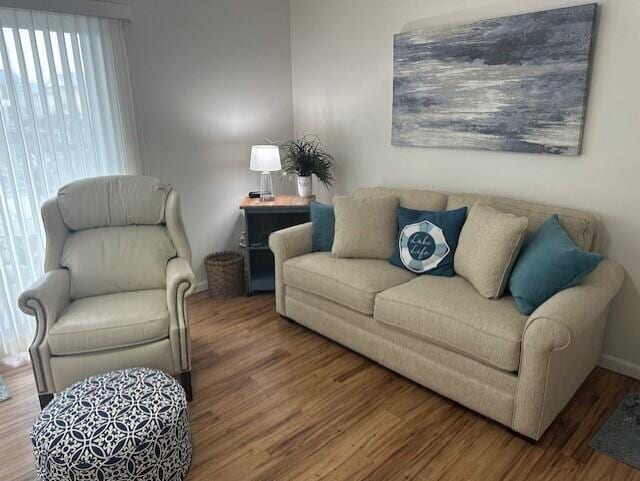 241 Chase Ave Unit B1L, Russells Point, OH 43348 - living area with wood finished floors and baseboards