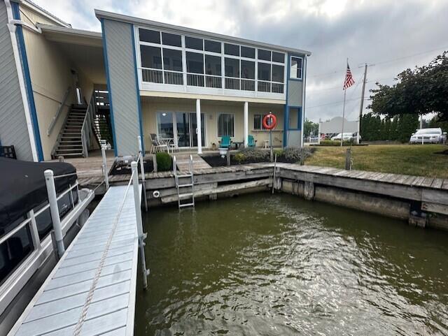 241 Chase Ave Unit B1L, Russells Point, OH 43348 - dock area with a water view and stairway