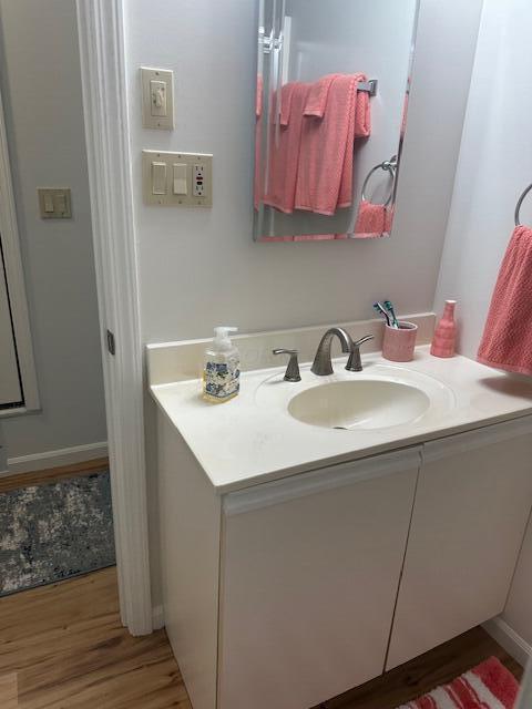 241 Chase Ave Unit B1L, Russells Point, OH 43348 - bathroom featuring vanity and wood finished floors