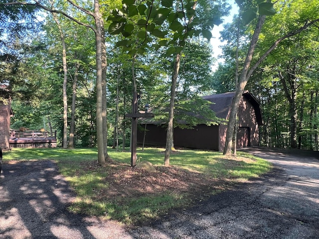 3502 Hazelton Etna Rd, Alexandria, OH 43001 - view of front of property with an outdoor structure, a garage, a barn, a shingled roof, and a front lawn