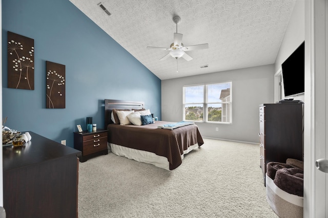 5466 Bull Creek Dr Unit 101, Dublin, OH 43016 - bedroom featuring carpet floors, a textured ceiling, vaulted ceiling, and a ceiling fan