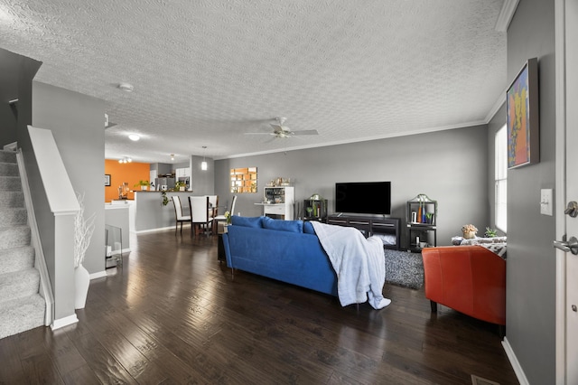 5466 Bull Creek Dr Unit 101, Dublin, OH 43016 - living area featuring ceiling fan, a textured ceiling, hardwood / wood-style floors, and stairway