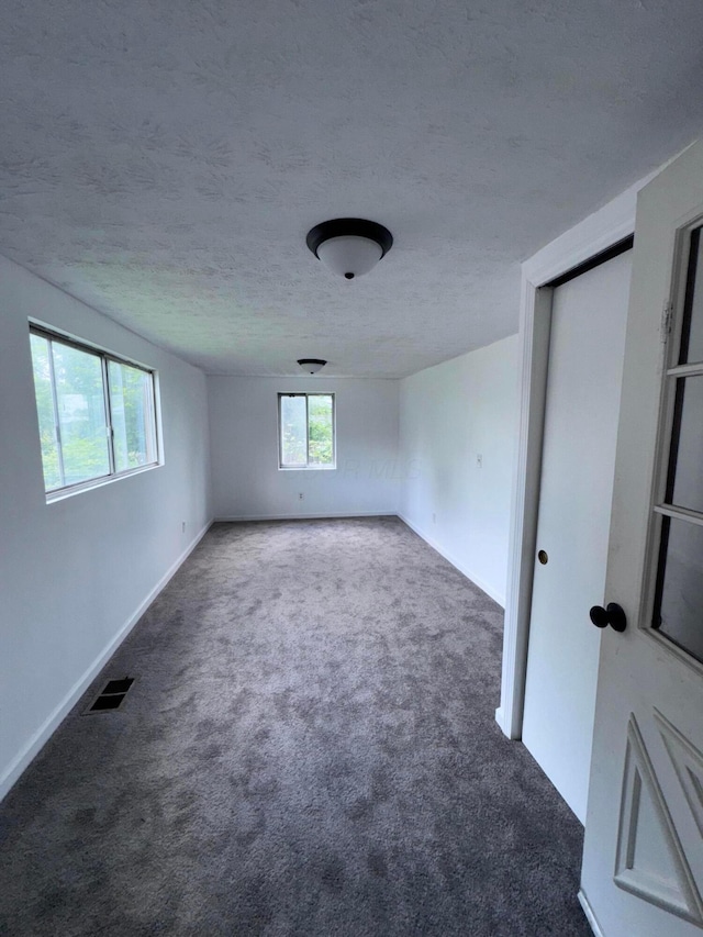 2229 Maureen Blvd N, Obetz, OH 43207 - carpeted empty room with a textured ceiling and baseboards