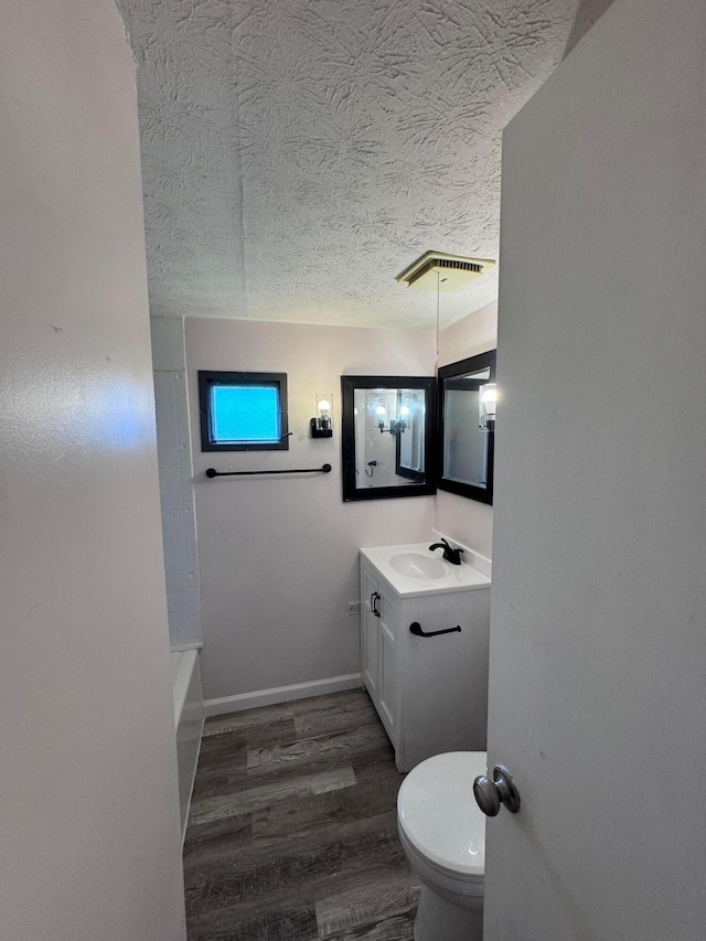 2229 Maureen Blvd N, Obetz, OH 43207 - bathroom featuring vanity, wood finished floors, and a textured ceiling