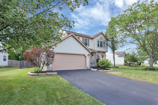 8512 Squad Dr, Galloway, OH 43119 - view of front of property with asphalt driveway and an attached garage