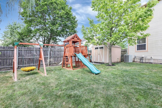 8512 Squad Dr, Galloway, OH 43119 - view of jungle gym featuring a fenced backyard and a storage shed