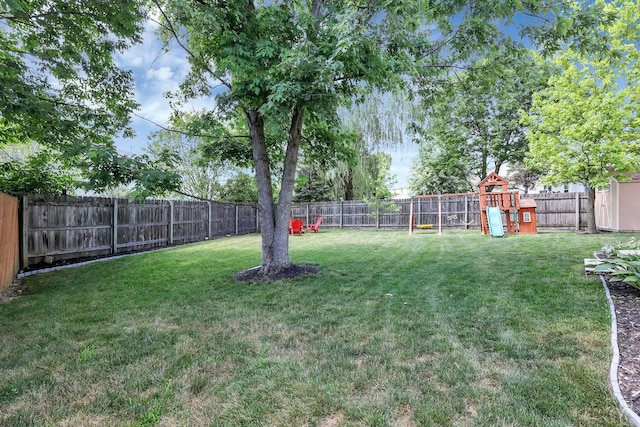 8512 Squad Dr, Galloway, OH 43119 - fenced backyard with a playground