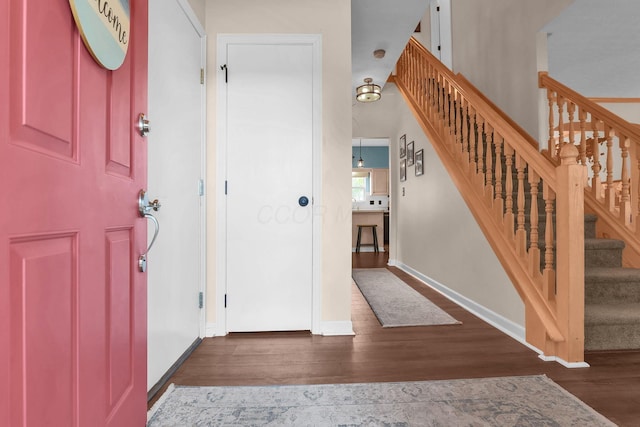 8512 Squad Dr, Galloway, OH 43119 - entrance foyer featuring wood finished floors and stairway
