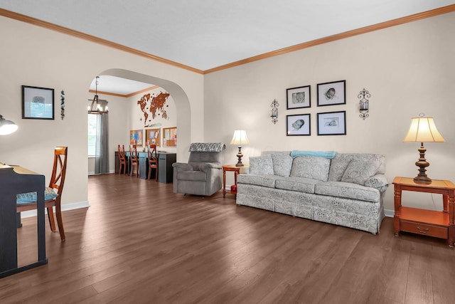 8512 Squad Dr, Galloway, OH 43119 - living area with arched walkways, wood finished floors, a chandelier, and crown molding