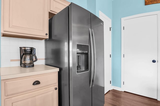 8512 Squad Dr, Galloway, OH 43119 - kitchen featuring stainless steel fridge with ice dispenser, dark wood-style flooring, backsplash, light countertops, and cream cabinets