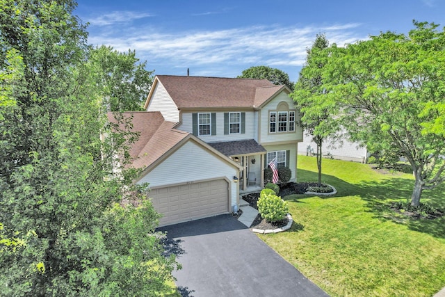 8512 Squad Dr, Galloway, OH 43119 - traditional-style house with driveway, a front yard, a shingled roof, and a garage