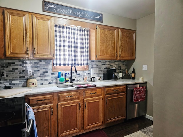 112 N George St, Lancaster, OH 43130 - kitchen with range with electric stovetop, backsplash, stainless steel dishwasher, and brown cabinets