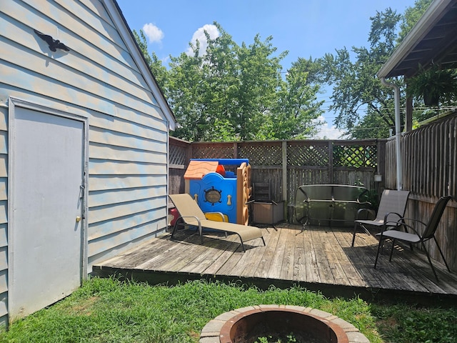 112 N George St, Lancaster, OH 43130 - wooden deck featuring a fire pit