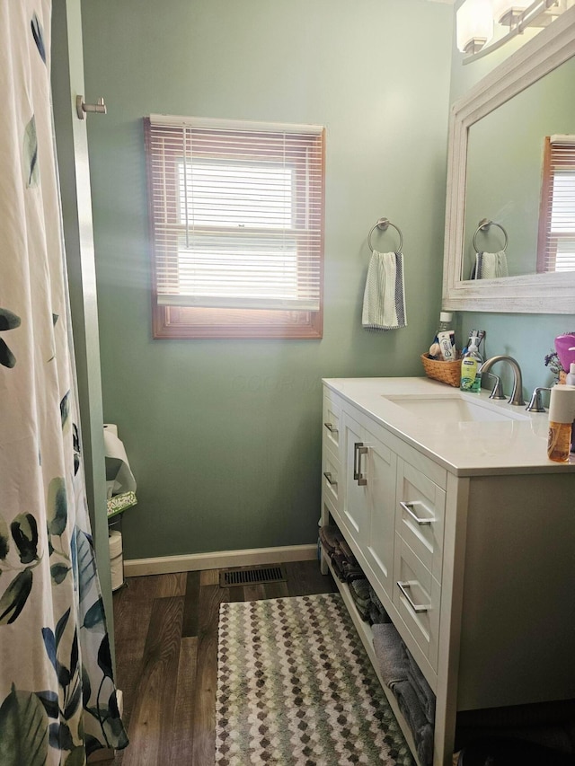 112 N George St, Lancaster, OH 43130 - bathroom featuring vanity and wood finished floors