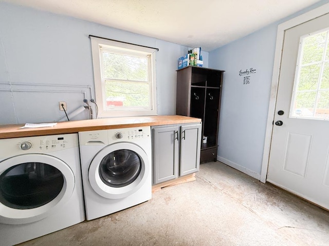206 William St, Fulton, OH 43321 - washroom featuring cabinet space and washing machine and clothes dryer