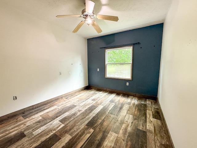 206 William St, Fulton, OH 43321 - unfurnished room with wood finished floors and a ceiling fan
