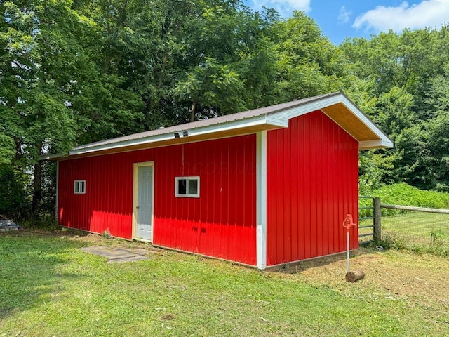 206 William St, Fulton, OH 43321 - view of outdoor structure with a forest view