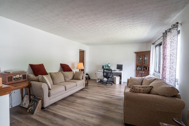3709 Juniper St, Grove City, OH 43123 - living area featuring a desk, wood finished floors, and a textured ceiling