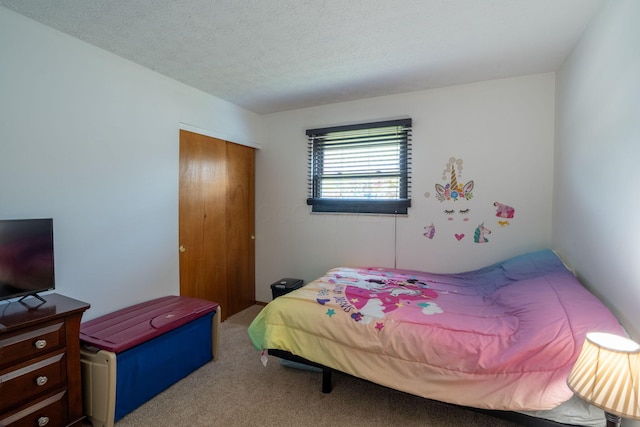 3709 Juniper St, Grove City, OH 43123 - bedroom with a closet, carpet floors, and a textured ceiling