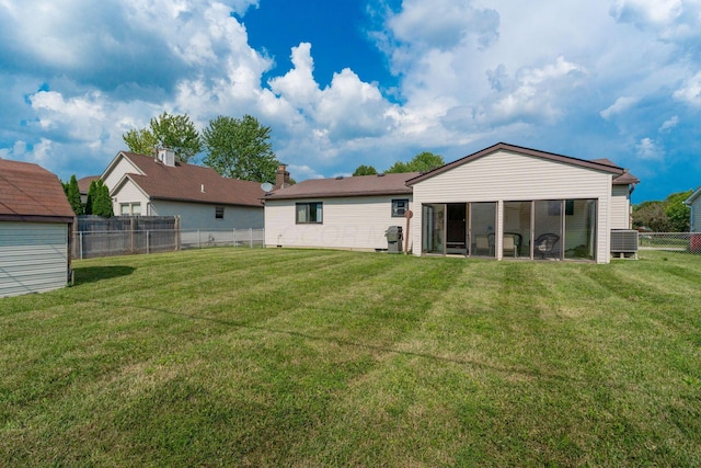 3709 Juniper St, Grove City, OH 43123 - rear view of house with a sunroom and a fenced backyard