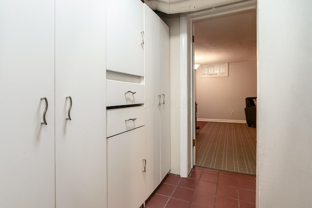 1010 Vernon Rd, Columbus, OH 43209 - hall featuring dark carpet and dark tile patterned floors