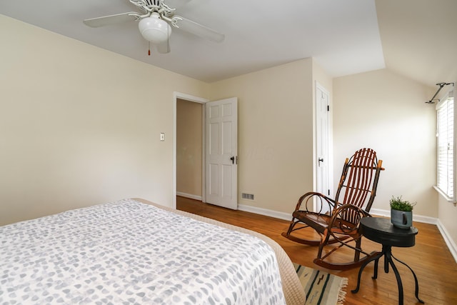 1010 Vernon Rd, Columbus, OH 43209 - bedroom with wood finished floors, lofted ceiling, and a ceiling fan