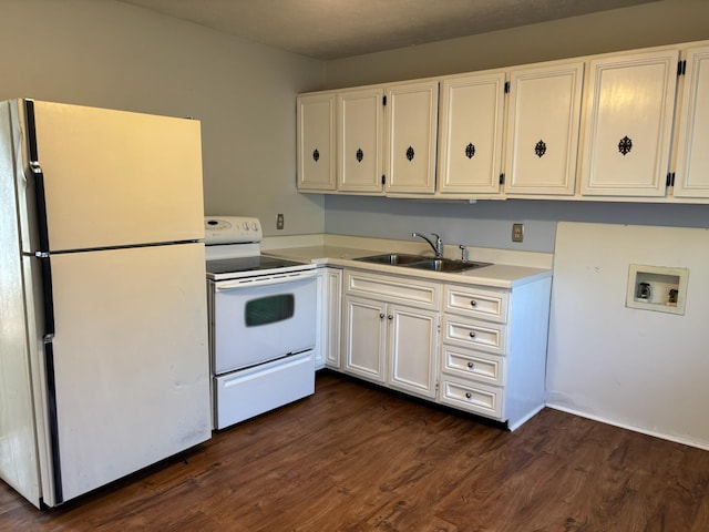 1115 Bermuda Dr, Marion, OH 43302 - kitchen featuring white appliances, white cabinets, light countertops, and dark wood finished floors