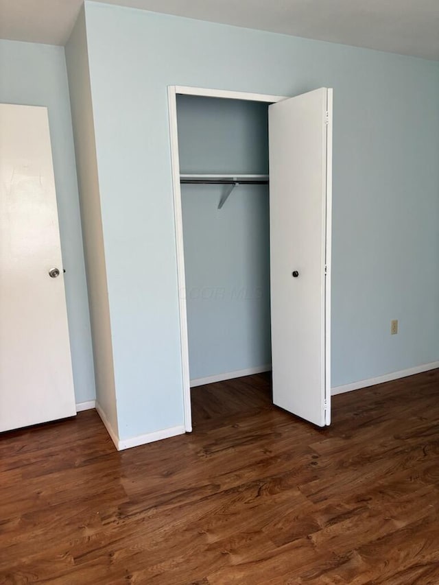 1115 Bermuda Dr, Marion, OH 43302 - unfurnished bedroom with a closet and wood finished floors