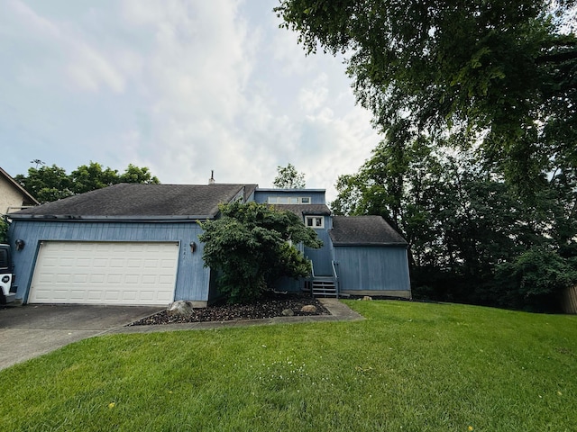 2687 Cooper Ridge Rd, Columbus, OH 43231 - view of front of property featuring driveway, an attached garage, a front yard, entry steps, and roof with shingles