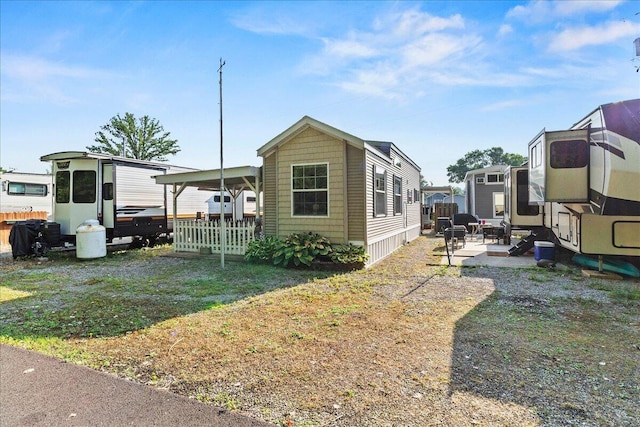 10950 Cherokee Dr Unit 59, Lakeview, OH 43331 - view of front of home featuring a patio